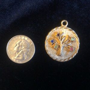 Gold pendant with birthstones